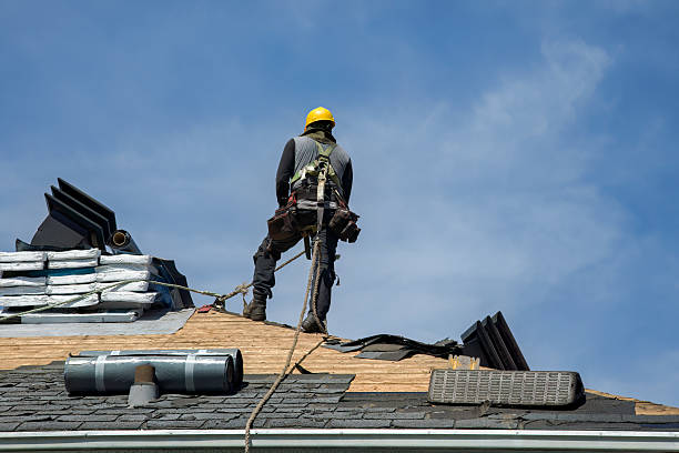 Professional Roof Replacement technician working in South Park, WY